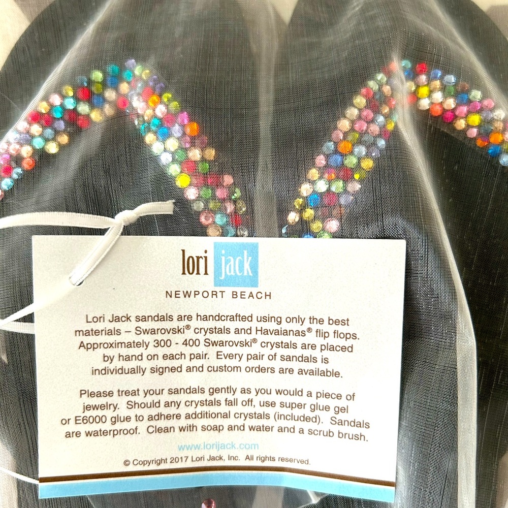 Women’s size 6.5 37/38 Lori Jack Havaianas flip flops with Swarovski crystals.